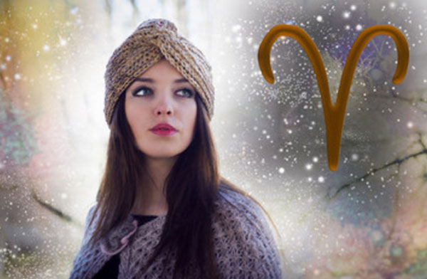 Девушка. Рядом с ней нарисован знак Овна