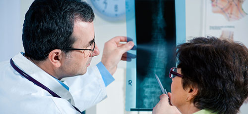 Причины боли в позвоночнике при сидячей работе